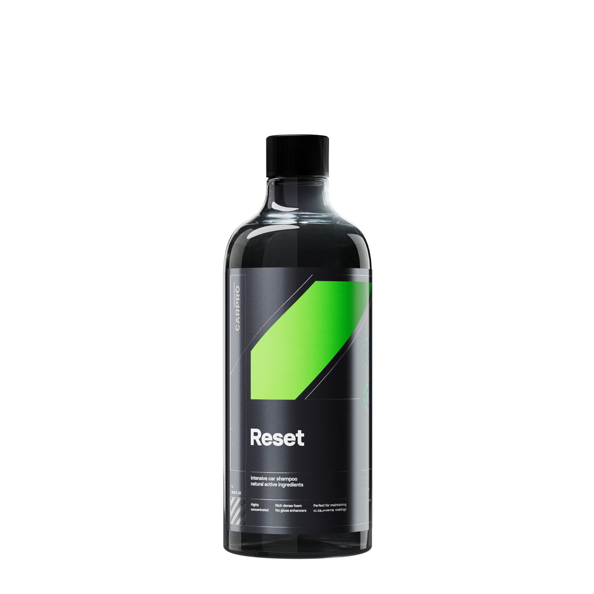 Flacone di CARPRO Reset, uno shampoo neutro con etichetta bianca, nera e verde, progettato per la pulizia delle auto mantenendo gli ingredienti protettivi, ideale per un lavaggio efficace e sicuro.
