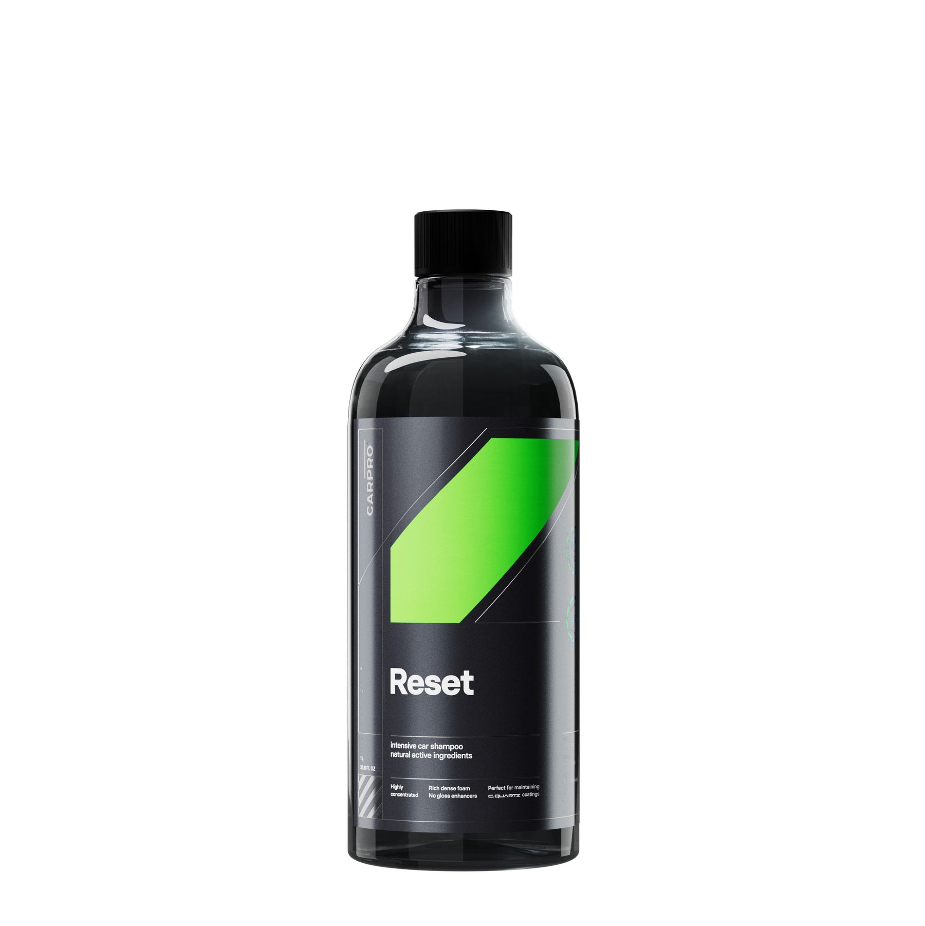 Flacone di CARPRO Reset, uno shampoo neutro con etichetta bianca, nera e verde, progettato per la pulizia delle auto mantenendo gli ingredienti protettivi, ideale per un lavaggio efficace e sicuro.
