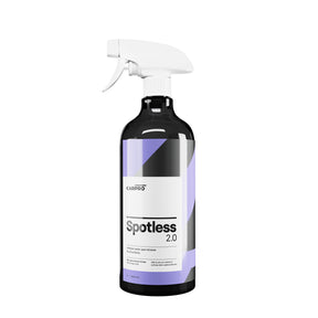  Grande bottiglia spray di CARPRO Spotless 2.0 detergente per rimozione macchie di calcare, con etichetta bianca e viola, su sfondo bianco.