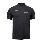 Polo nera CARPRO con loghi C.QUARTZ e D.QUARTZ sulla parte anteriore, ideale per professionisti del detailing.