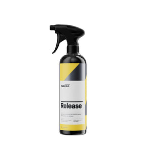 Flacone di CARPRO Release per protezione a lungo termine delle vernici ceramiche dell'auto, con etichetta bianca e gialla e spruzzatore nero.