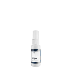 Bottiglia di CARPRO ReTyre pulitore per pneumatici con etichetta bianca e blu, su sfondo bianco.