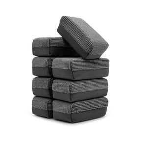 Set di applicatori Barrier Sponge grigie impilate, ideali per applicazioni uniformi di prodotti durante il detailing auto, offrendo protezione e cura delle superfici.