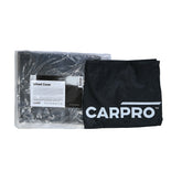 Confezione di CarPro Wheels Cover per proteggere le ruote durante il detailing, con coperture nere resistenti e logo CarPro.